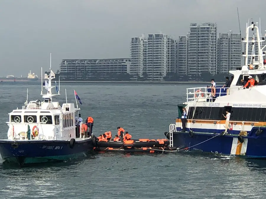 Transfer of passengers from liferaft to MPA rescue vessel