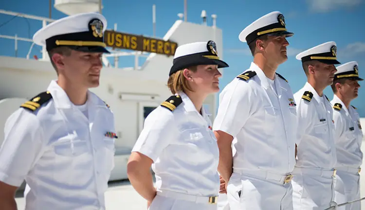 A ship has a permanent crew with a commanding officer. Image: 